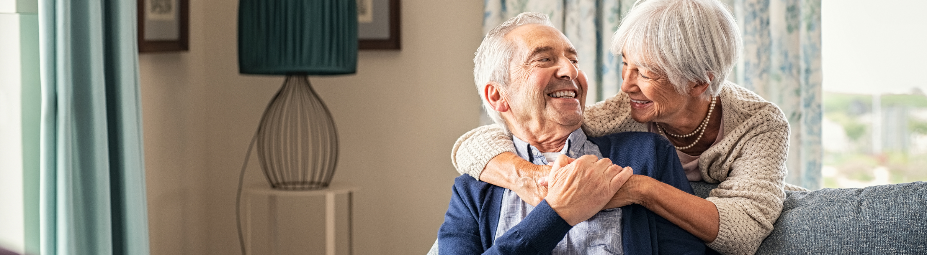 Older adult taking support in shower